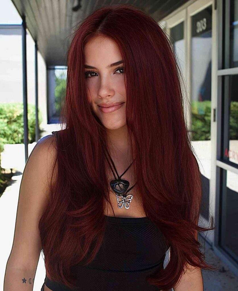 Auburn red hair with face-framing layers