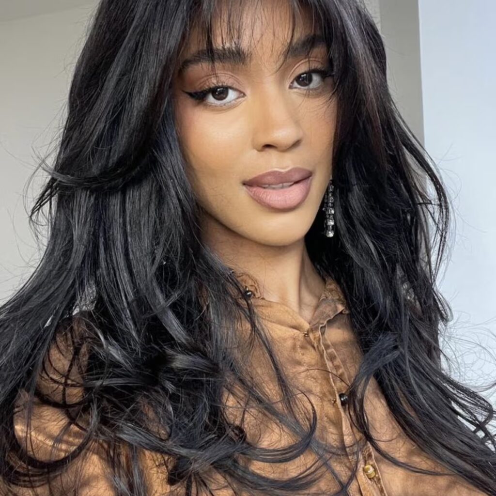 long layered bangs hairstyle with face framing layers