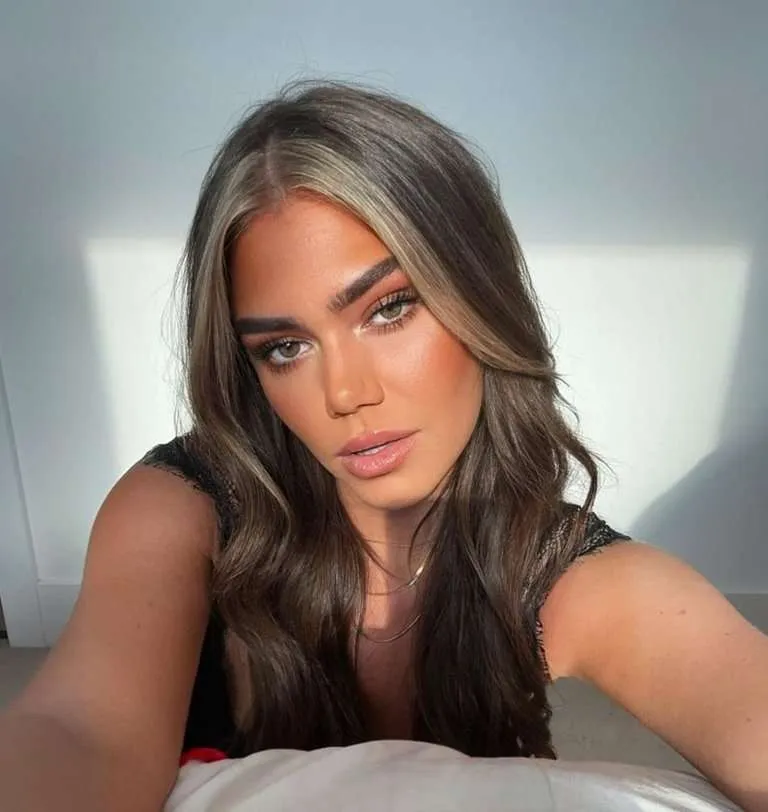 blonde money piece hair with soft waves